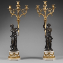 Large pair of richly decorated candelabras